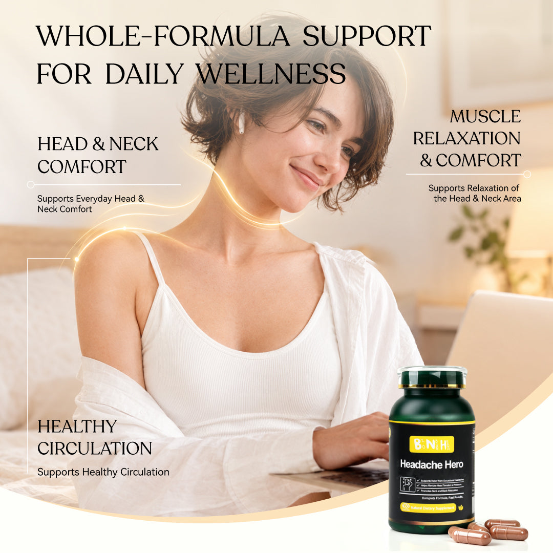 Woman relaxing at her laptop with Headache Hero for head, neck and shoulder comfort on screen-heavy days